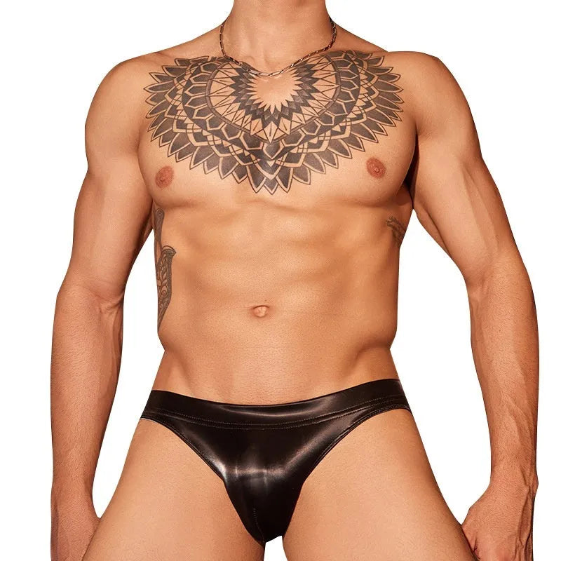 Black and white men's hip briefs made from shark skin lace polyester fabric.