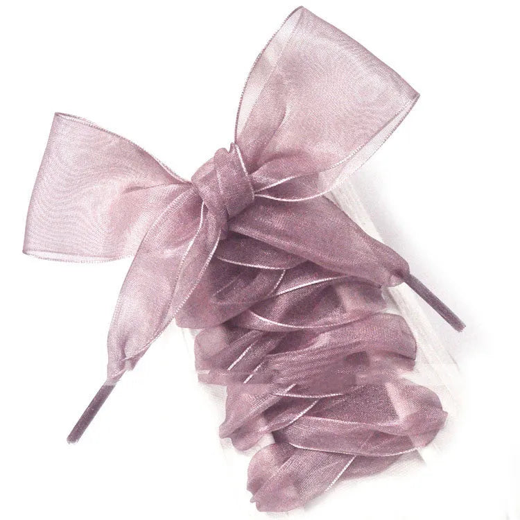 Wide transparent lace shoelaces in multiple solid colours showing 4cm width and length.