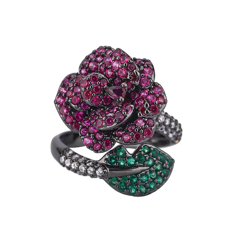 Gold-plated black gold ring with simulation red corundum stone and geometric flower design