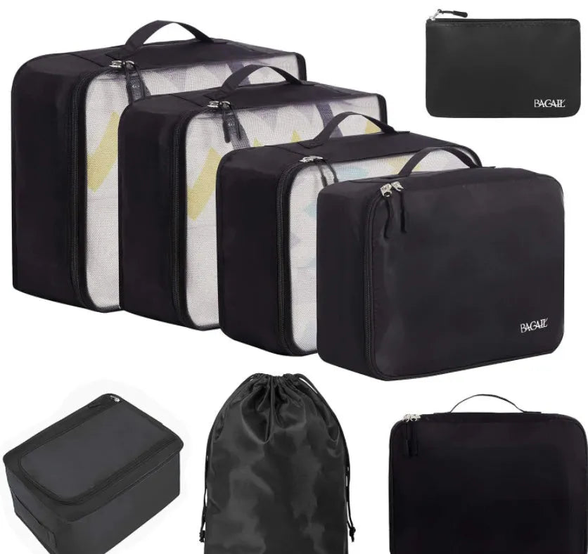 Set of eight cubic travel packing bags for underwear organisation in various colours including solid shades and patterns
