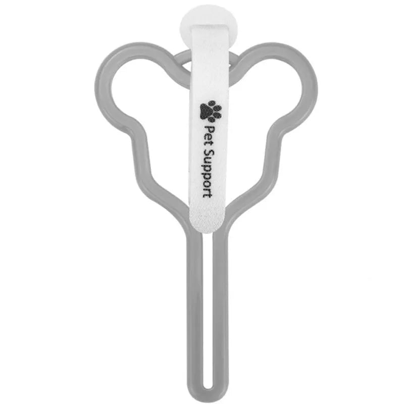Hands-free dog poop bag holder with Velcro strap attached to a leash.