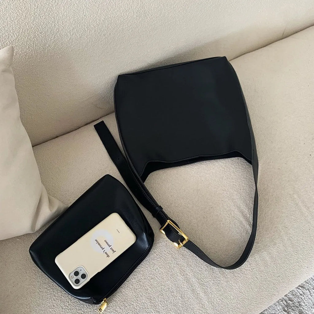 Two women's soft PU shoulder bags with swing threads, one black and one brown, showing structured design.