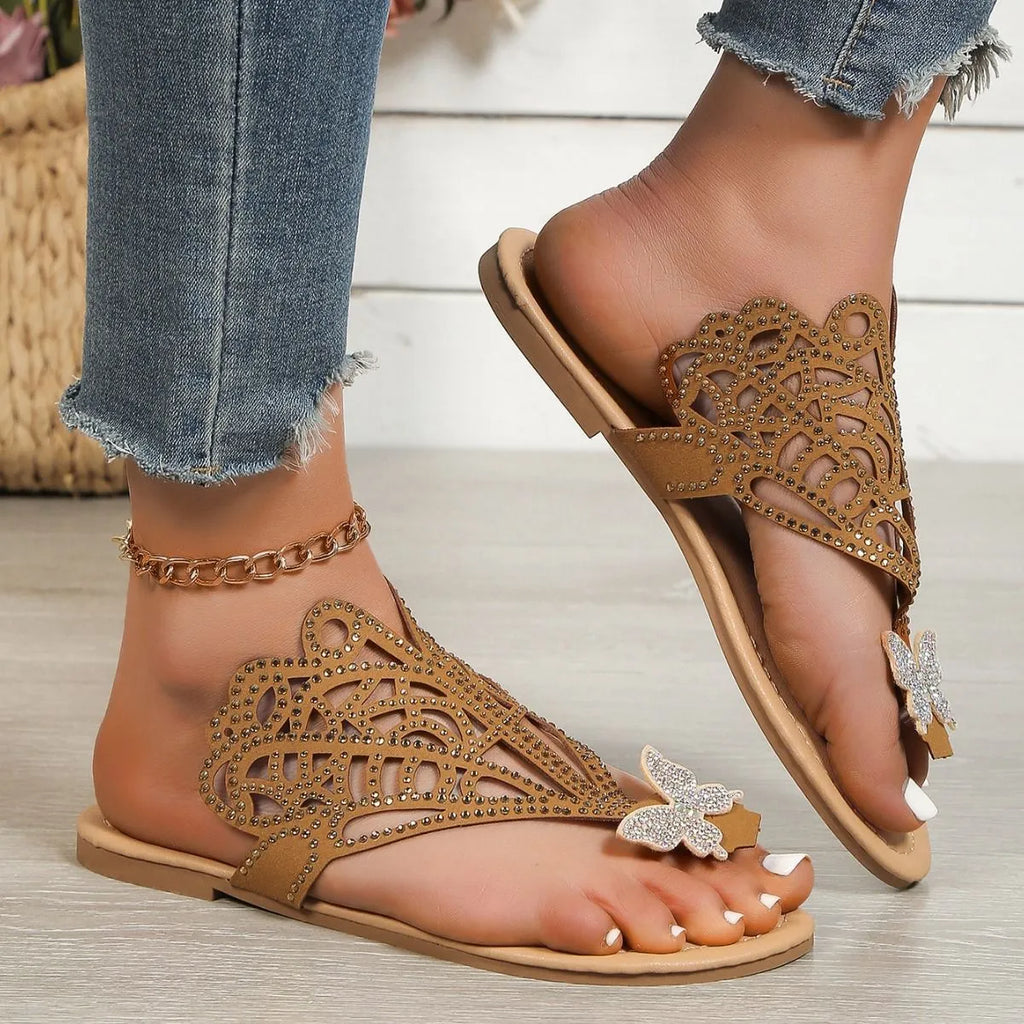 Women's black rhinestone flip-toe slip-on sandals with hollow design and flat rubber sole