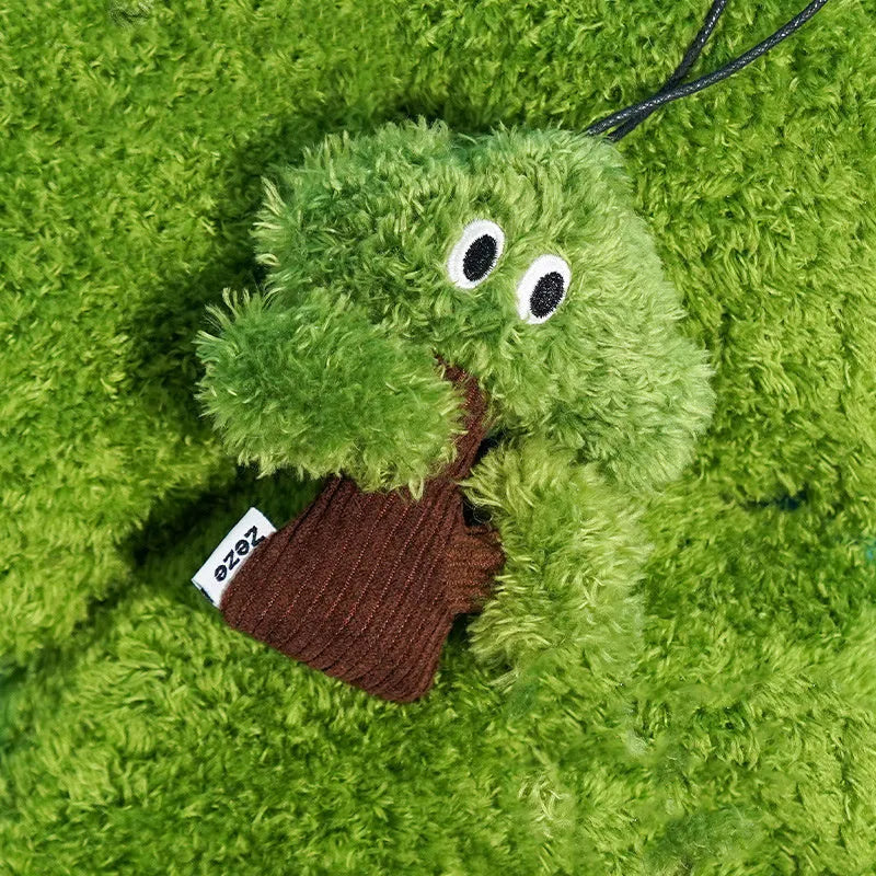 Plush pine tree-shaped cat toy with mint filling, shown in three available sizes for feline biting and grinding play.