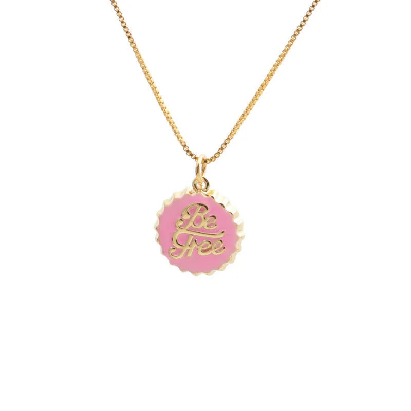 Copper bottle cap pendant necklace with gold electroplating on a box chain, shown in multiple colour options.
