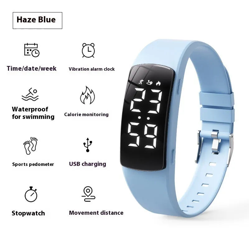 Vibration alarm clock watch with LED display on silicone strap showing multiple colour options