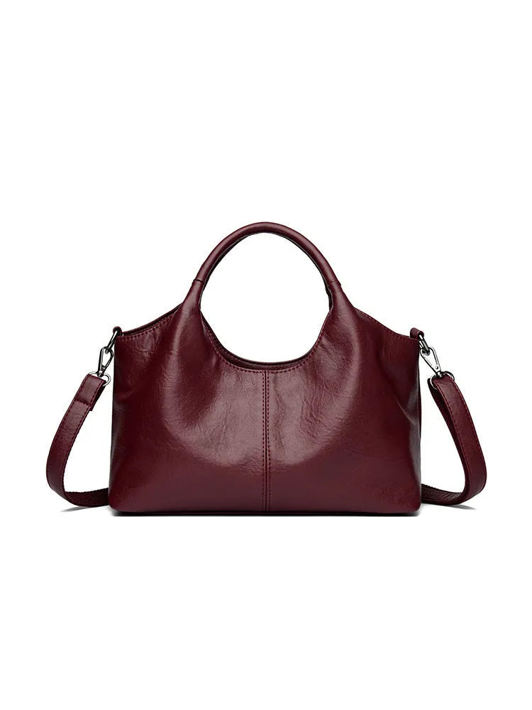 Genuine leather women's cross-body bag in available colours with adjustable shoulder strap