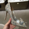 Women's gold high heels with pointed toes, rhinestone decoration, and stiletto heel