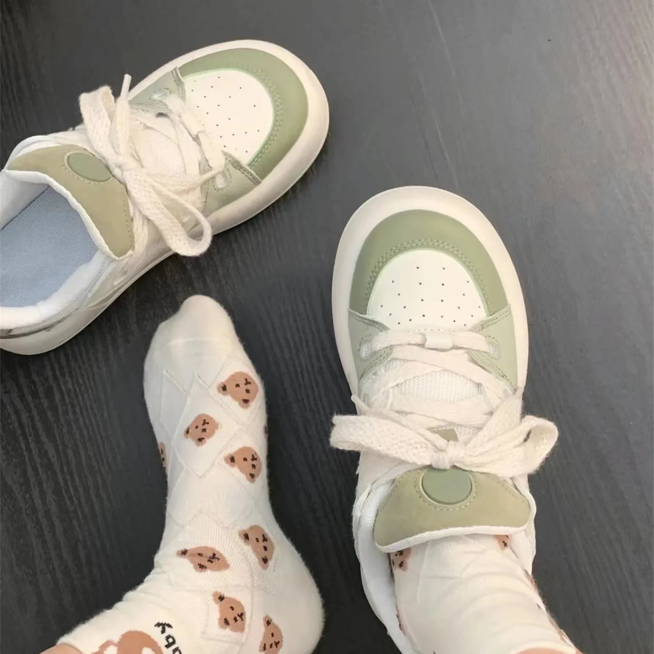 Green women's casual shoes with PU mesh upper, flat heel, and round toe design