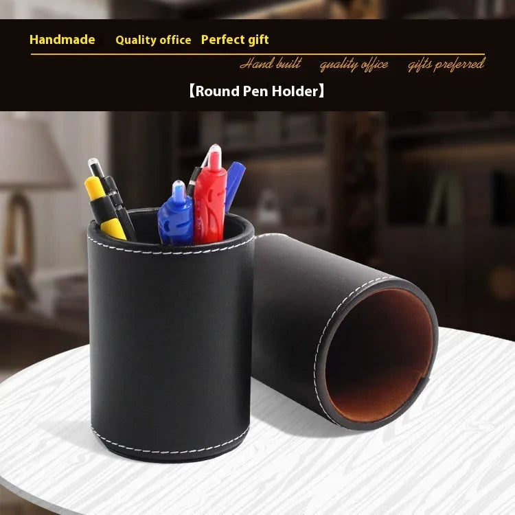 Round black leather pen container showing cylindrical shape and compact size for desk organisation.