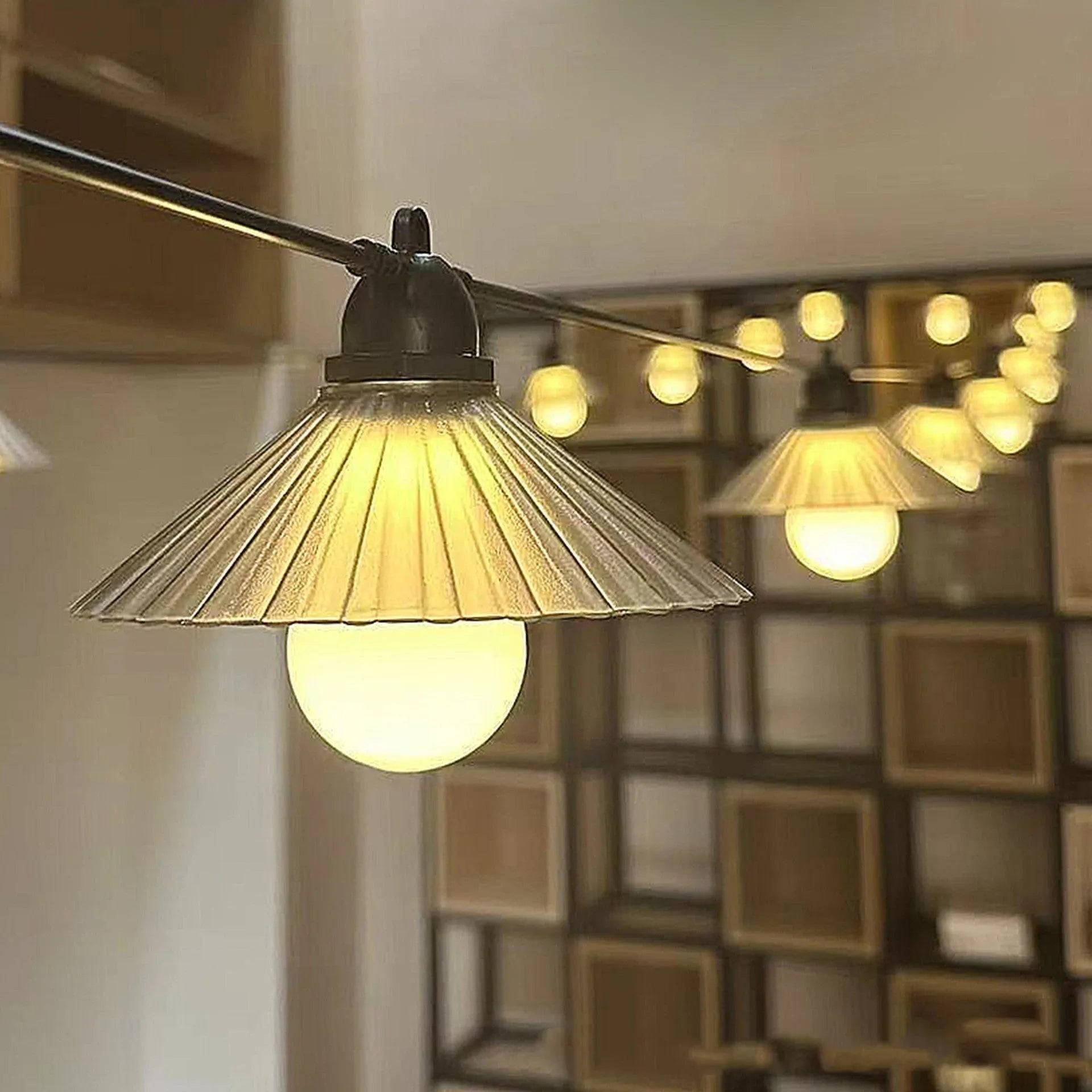Outdoor LED string lights with flower-shaped bulbs in warm white and coloured options for garden and camping