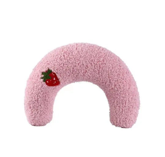 Small blue U-shaped plush pillow for cats or small dogs on a white background.