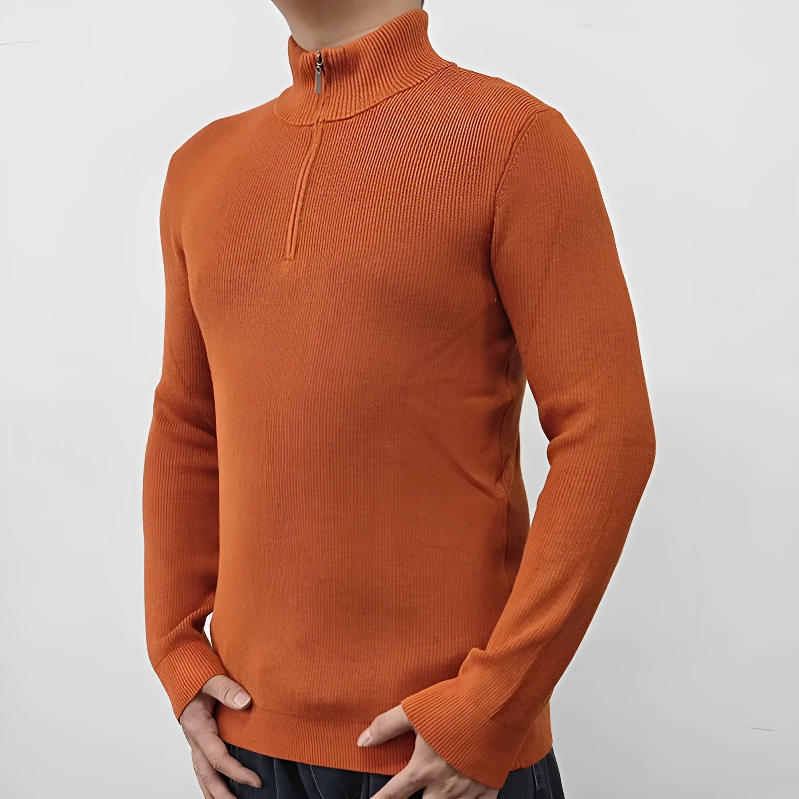 Man wearing a grey cotton blend half-turtleneck zip sweater with long sleeves