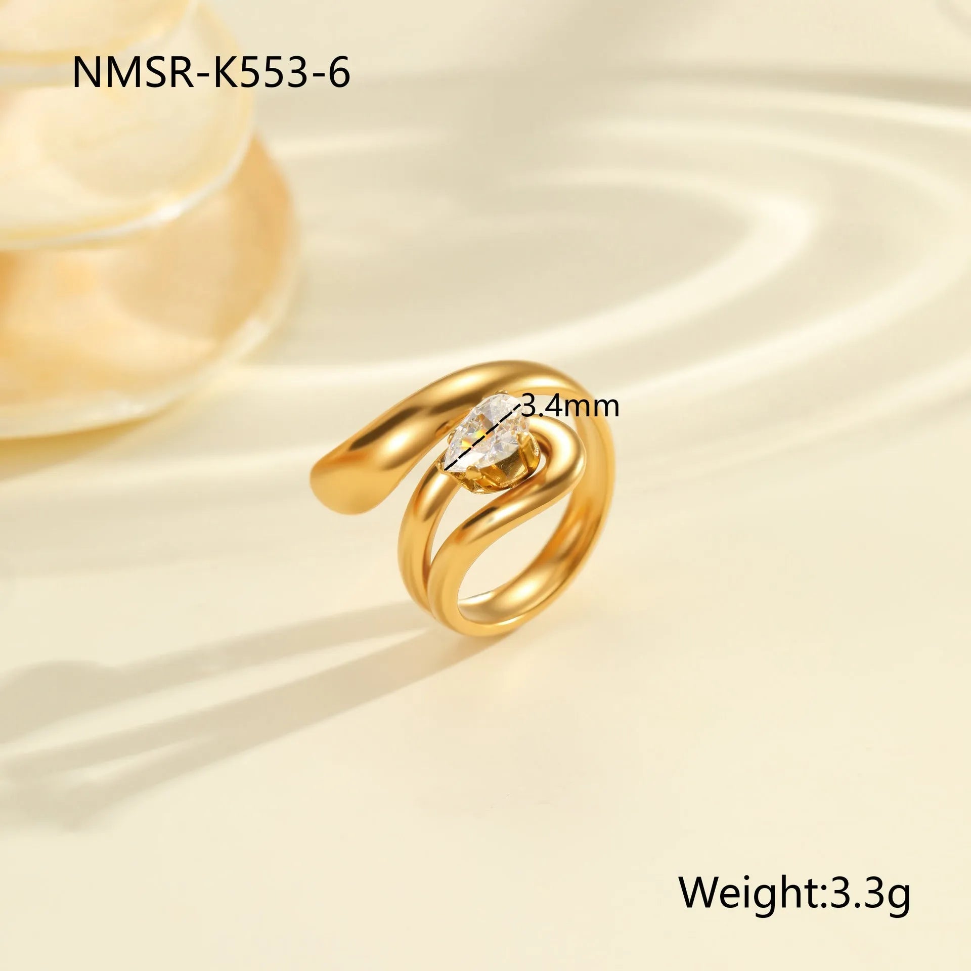 Women's geometric zircon ring with adjustable open mouth design on a hand.