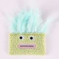 Colourful catnip plush toy with big mouth explosion head shape on a soft fabric body