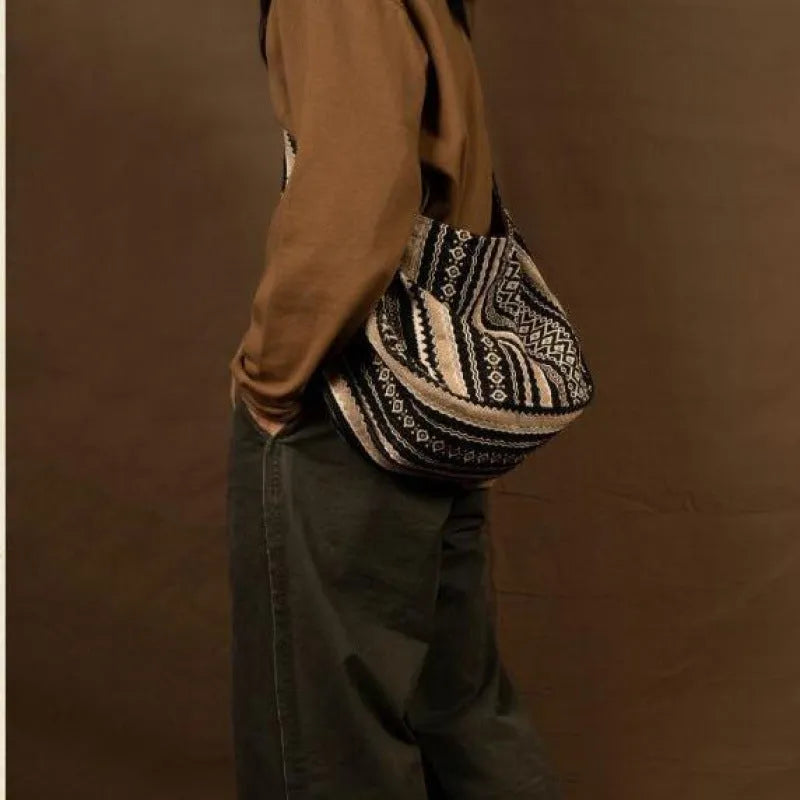 Retro striped corduroy messenger bag with adjustable plaid strap and zipper closure