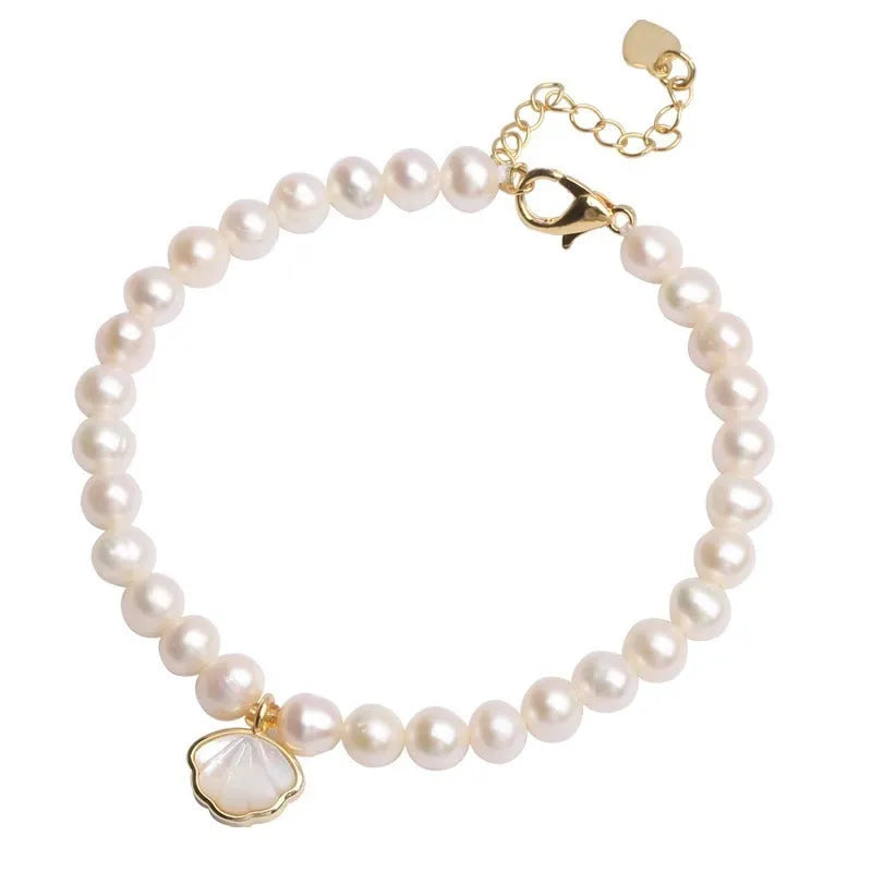A women's freshwater pearl bracelet with a fan-shaped design, shown in 16cm length with elastic and chain options.