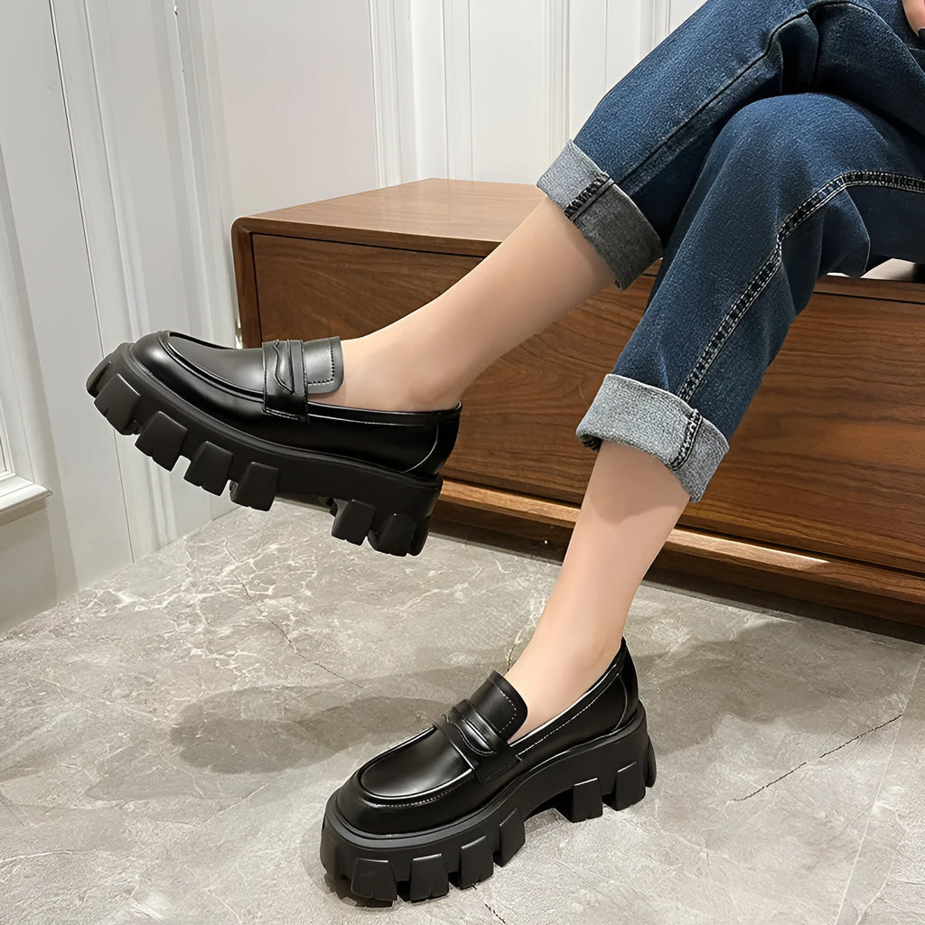 British style wide fat foot loafers in patent leather and matte finish, showing rubber sole and slip-on design.