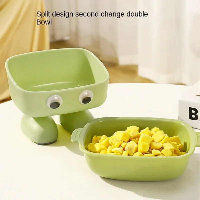 Green robot-shaped elevated cat bowl with tilted dish and non-slip base