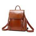 Genuine leather women's backpack in black with multiple compartments and dual shoulder straps