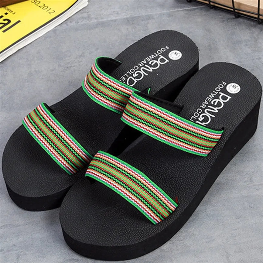 Women's brown bohemian summer slippers with a platform sole and elastic strap.
