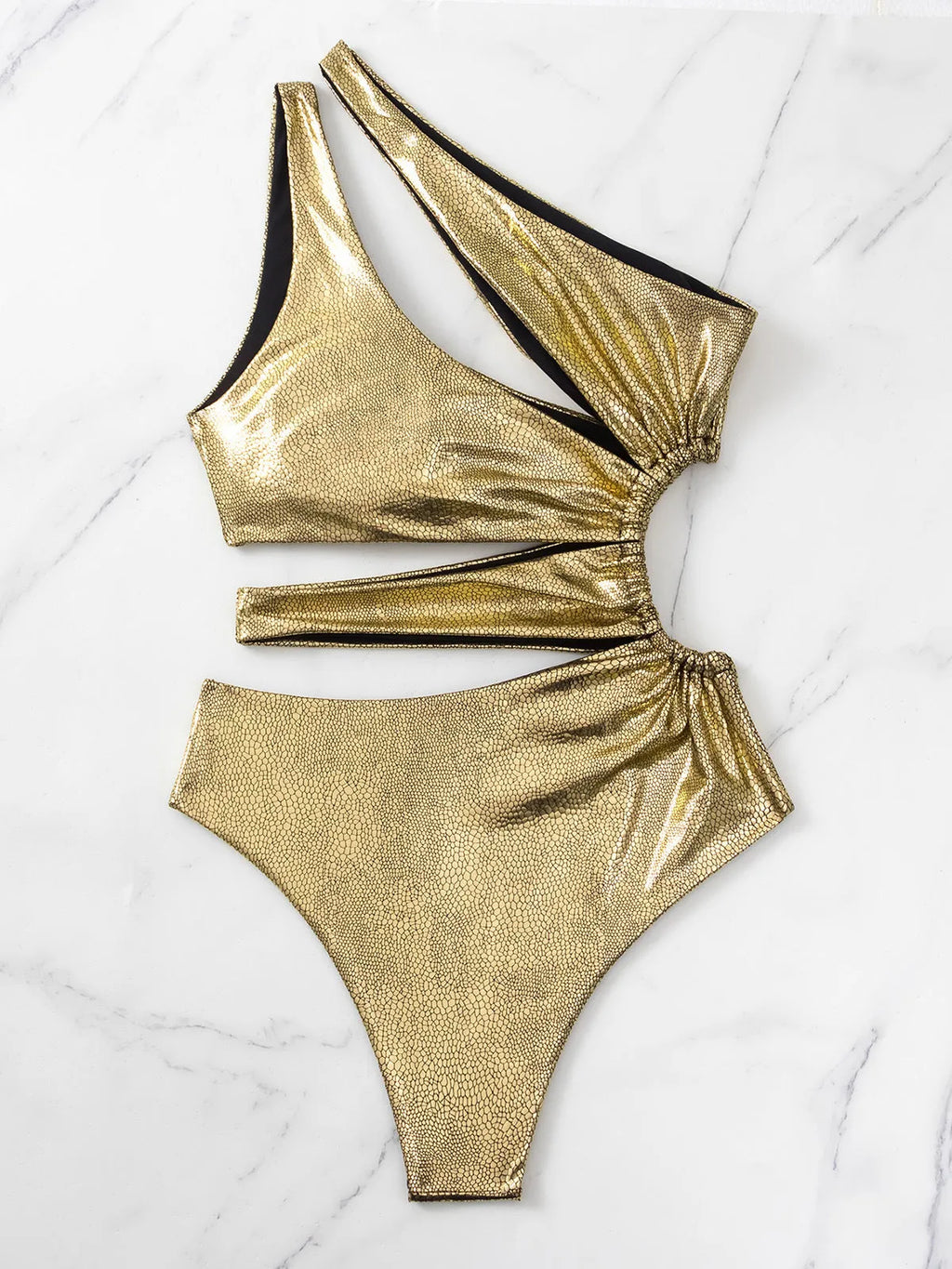 Gold backless one-piece swimsuit for women with spandex construction in S, M, L sizes