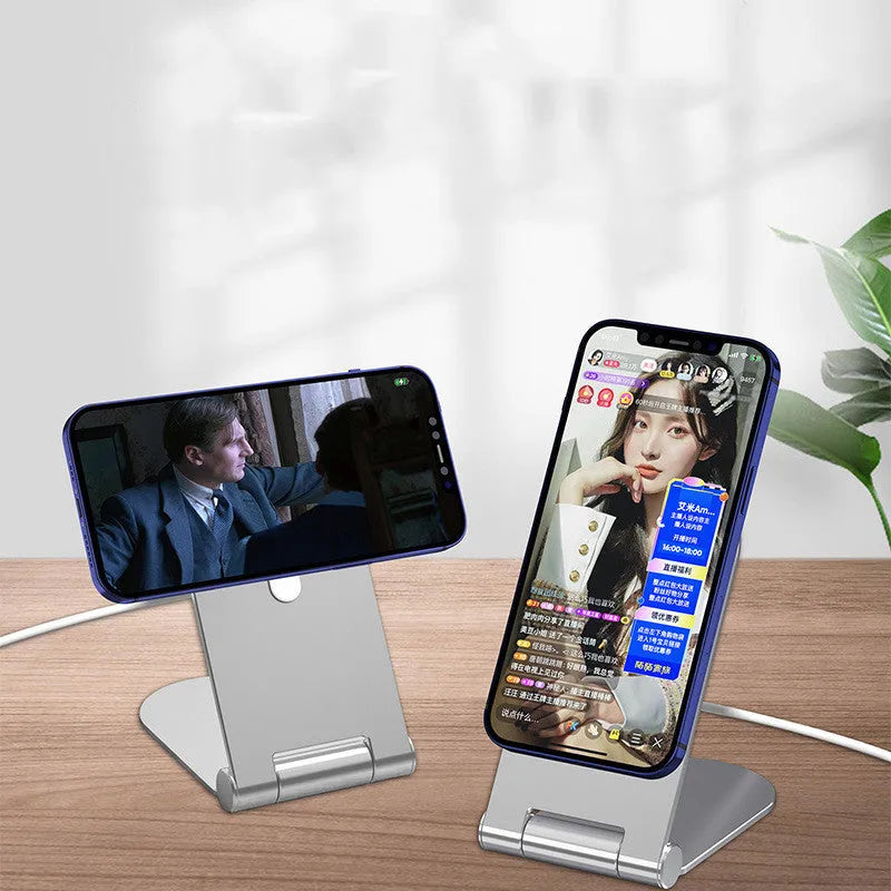 Silver vertical adjustable magnetic phone bracket for iPhone12 on a grey background.