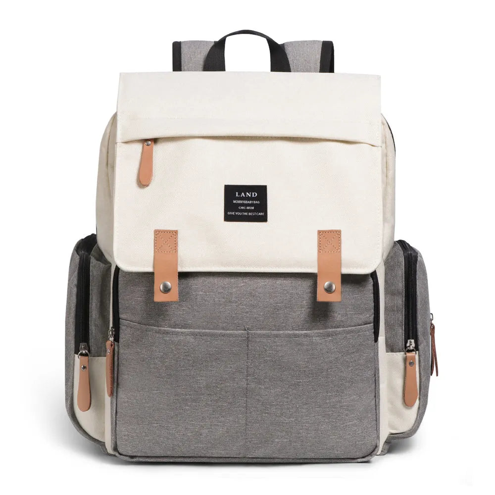 Large Oxford cloth diaper backpack with changing mat in beige colour, dimensions 33x39x15cm