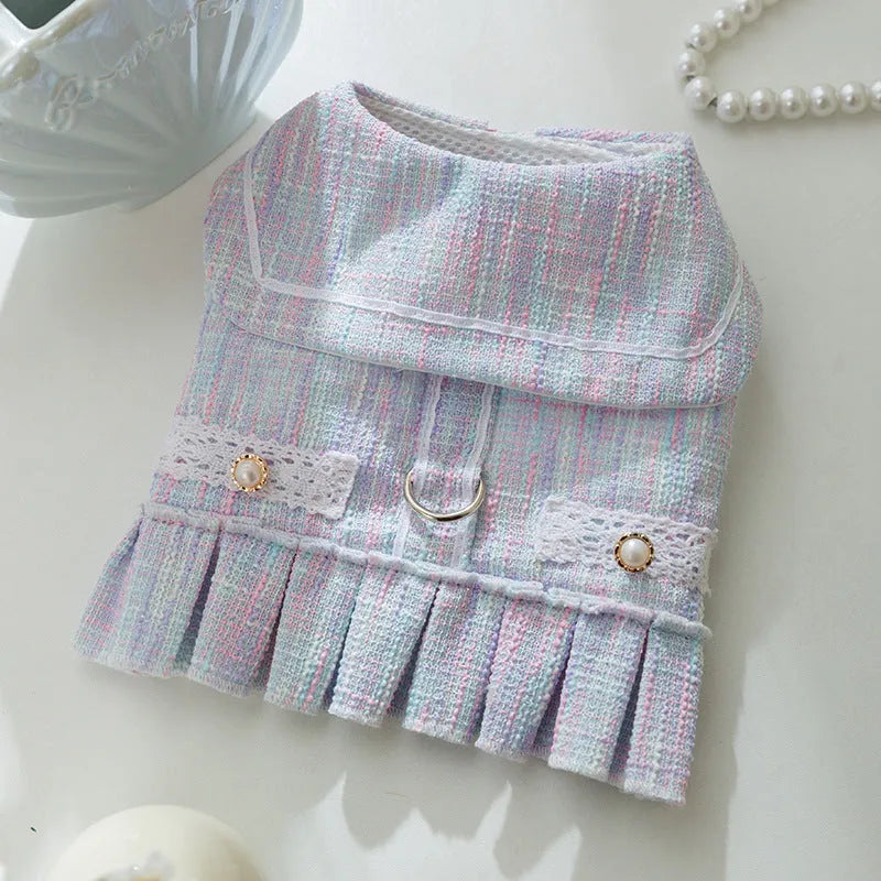 Purple and pink polyester pet clothing for small dogs and cats, showing sizes S, M, L, and XL.