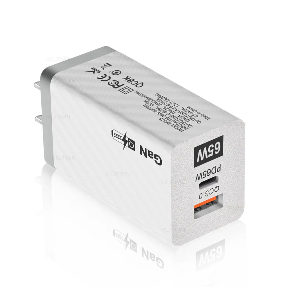 Gallium nitride 65W USB-PD laptop charger in black or white with compact dimensions and regional plug options