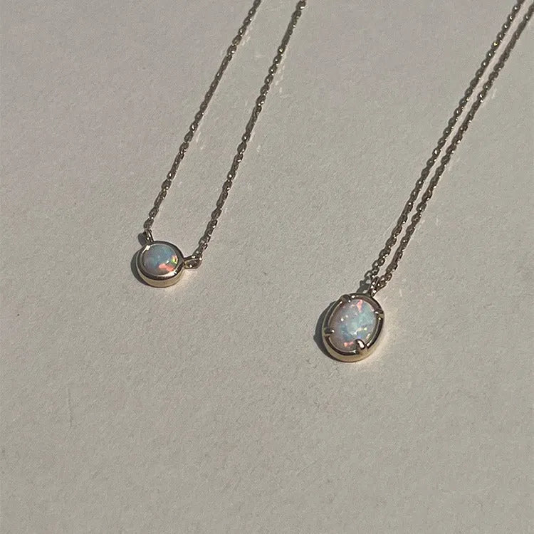 Geometric jelly opal pendant on a chain, made from 925 silver with gold or white gold plating.