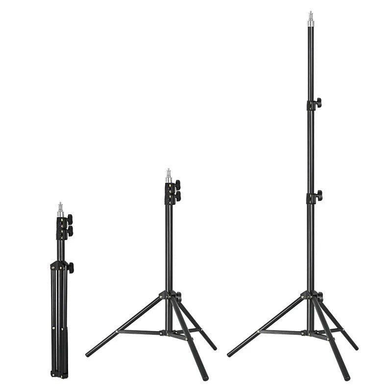Frosted finish tripod stand with mobile phone holder attached, showing height adjustment mechanism