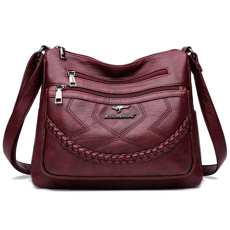 Soft PU leather crossbody shoulder bag in horizontal square shape with crossbody strap