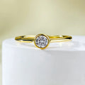 Minimalist crown-shaped silver ring with line detailing, shown in electroplated gold and platinum finishes