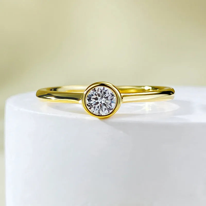 Minimalist crown-shaped silver ring with line detailing, shown in electroplated gold and platinum finishes