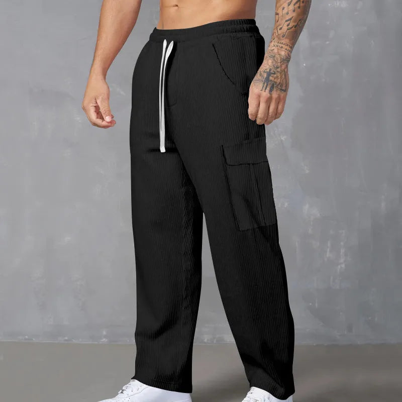 Men's corduroy cargo trousers in straight-leg design with drawstring waist available in multiple colours