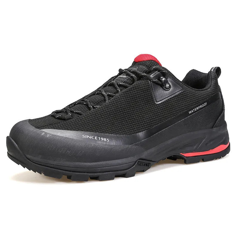 Men's low-top mountain climbing shoes in black with non-slip rubber outsole and lace-up design