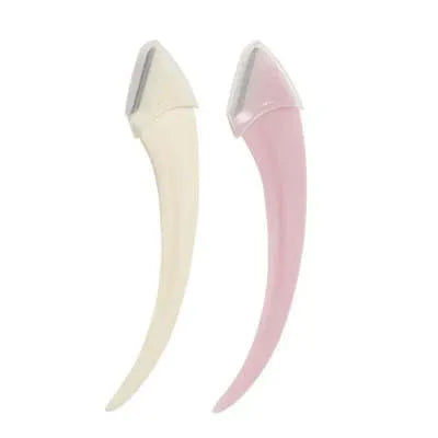 Close-up of a white and pink eyebrow trimming knife with a small comb attached on a plain background.