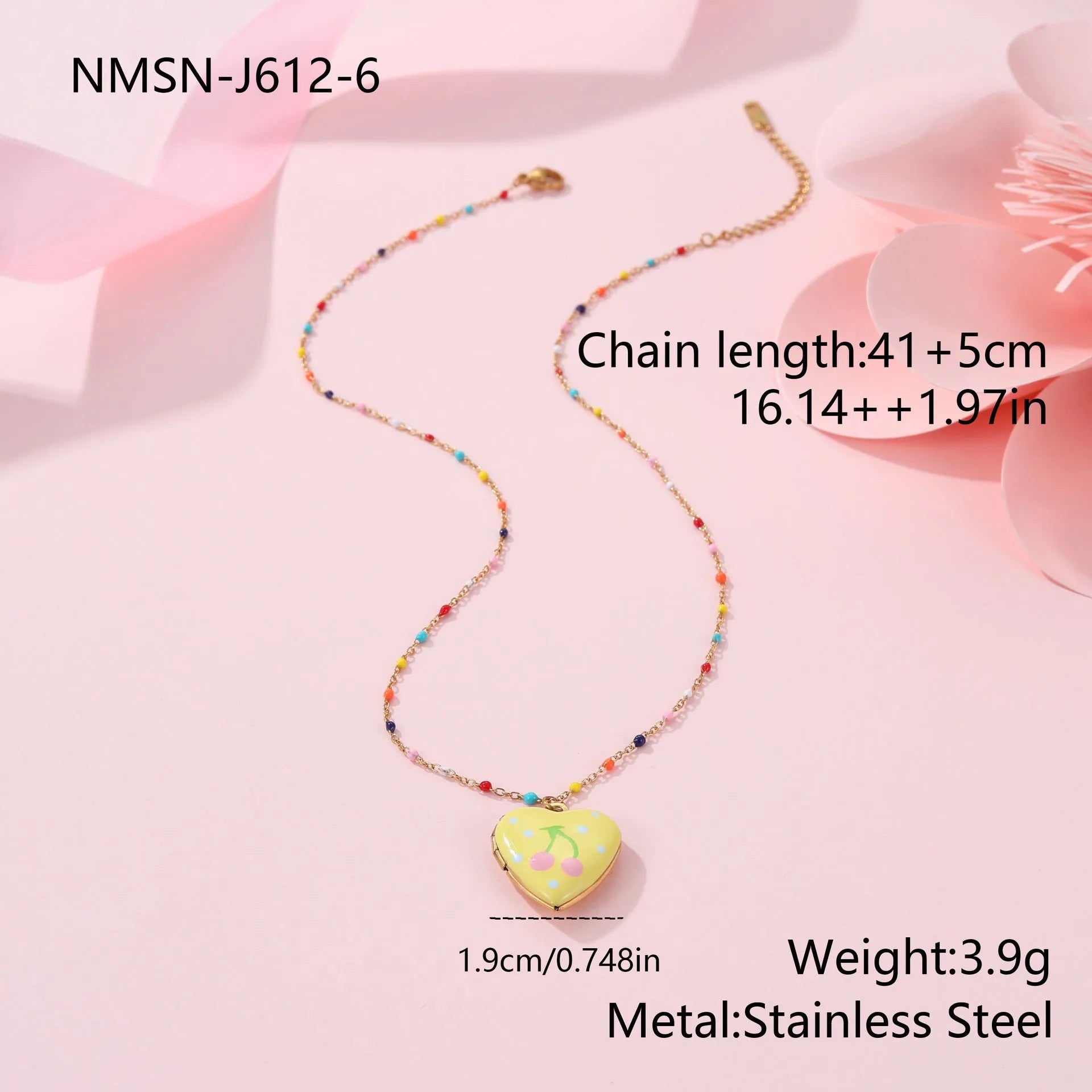 Women's stainless steel necklace with 18K gold plating showing heart pendant with fruit designs