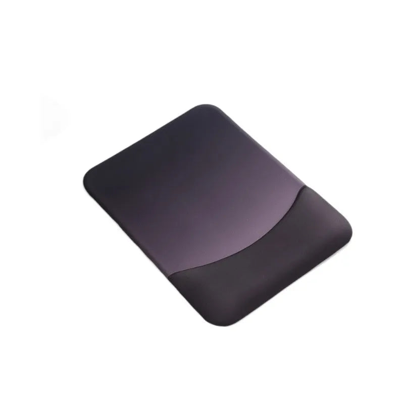 Square black silica gel wrist rest mouse pad on a desk with keyboard