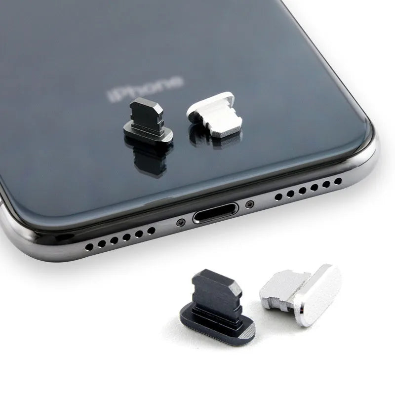Aluminium alloy mobile phone charging port dust plug for iPhones, shown in rose gold colour.