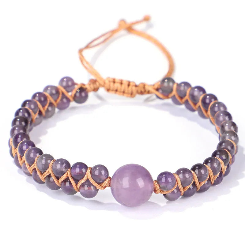 Handmade woven geometric bracelet with blue tigereye stone beads and adjustable pull closure.