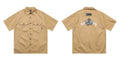 Men's loose black cotton blend half-sleeve shirt with a chest pocket