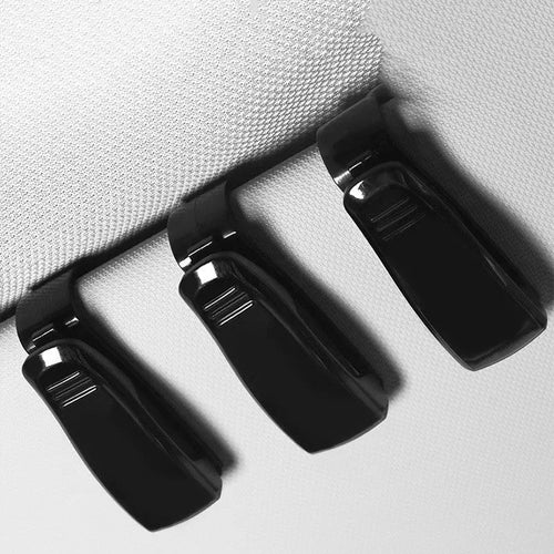 Black plastic car sunshade clip for holding glasses, tickets and ID cards