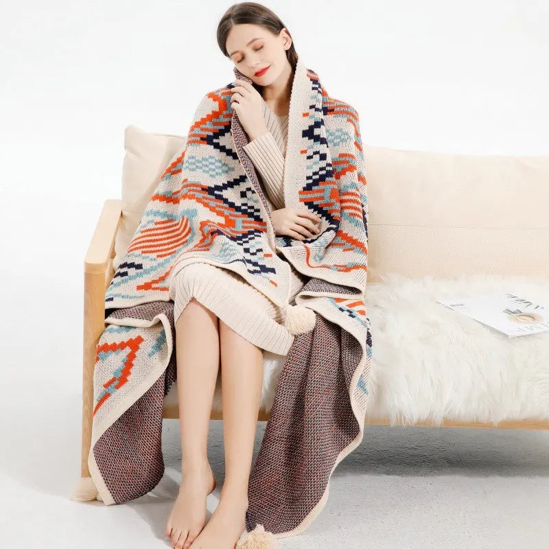 Bohemian-style acrylic sofa blanket with tassel edges in geometric pattern or solid colour options