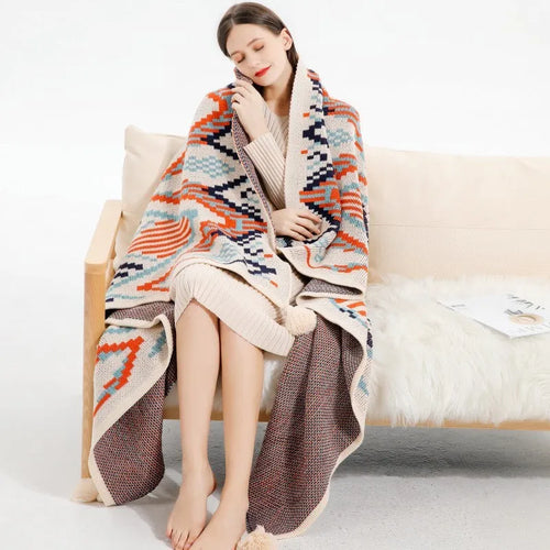 Bohemian-style acrylic sofa blanket with tassel edges in geometric pattern or solid colour options