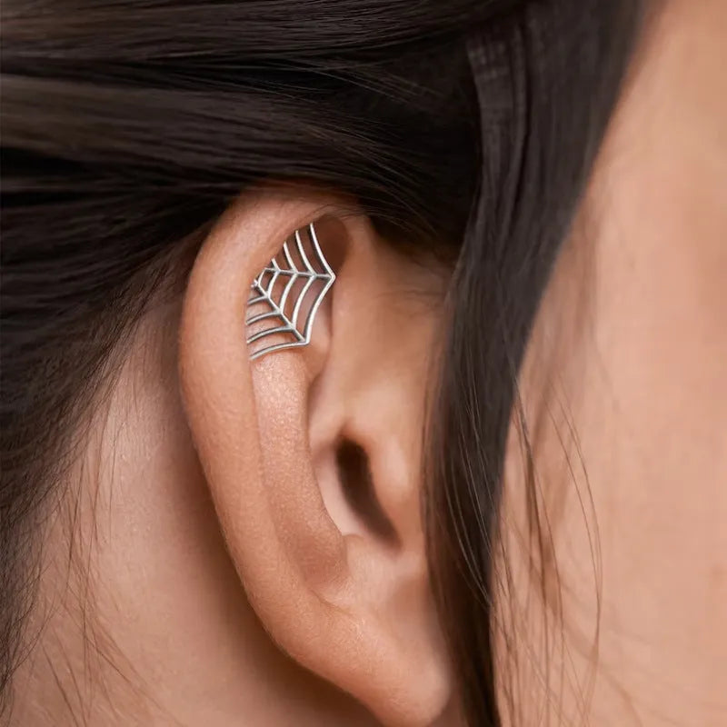 Spider web geometric mesh stud earrings in gold or silver electroplated metal for Halloween jewellery