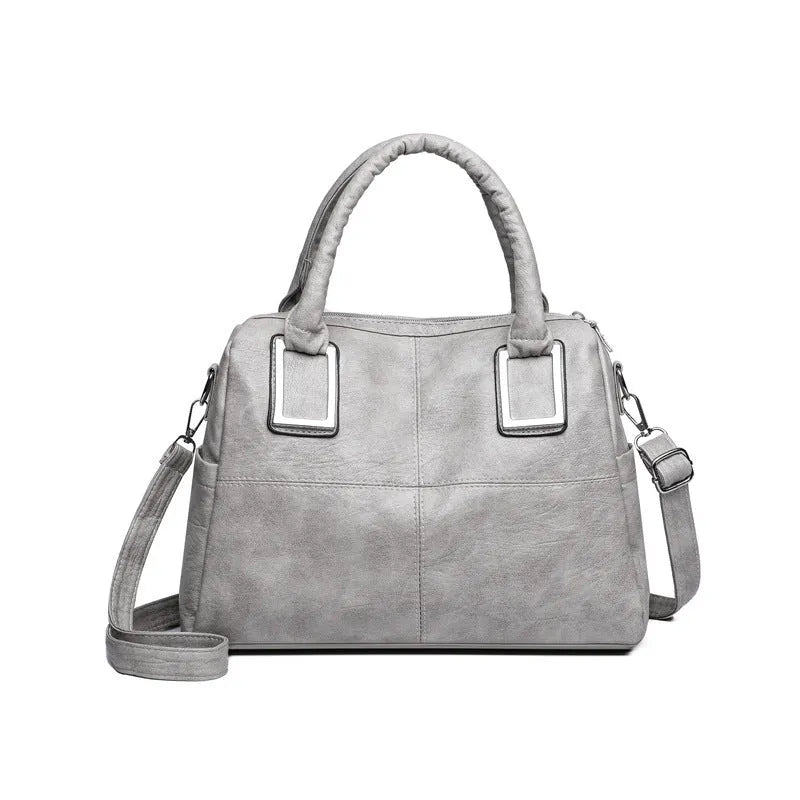 Women's large capacity shoulder bag in horizontal square shape with internal phone pocket and document compartment