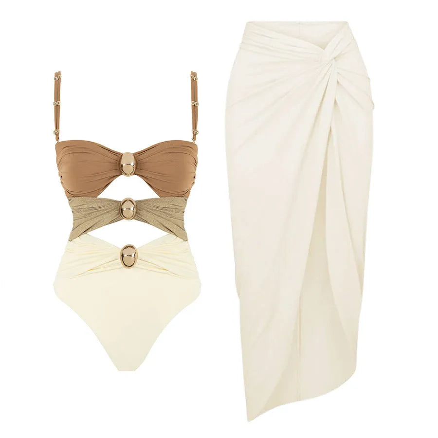Women's solid colour one-piece swimsuit with gold buttons and a matching skirt in assorted colours