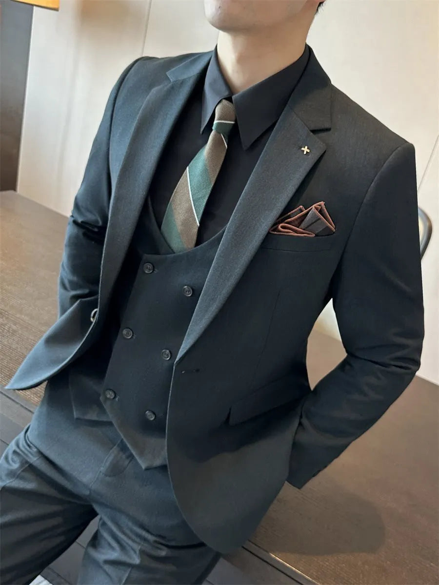 Men's dark green slim fit business suit jacket on a hanger.